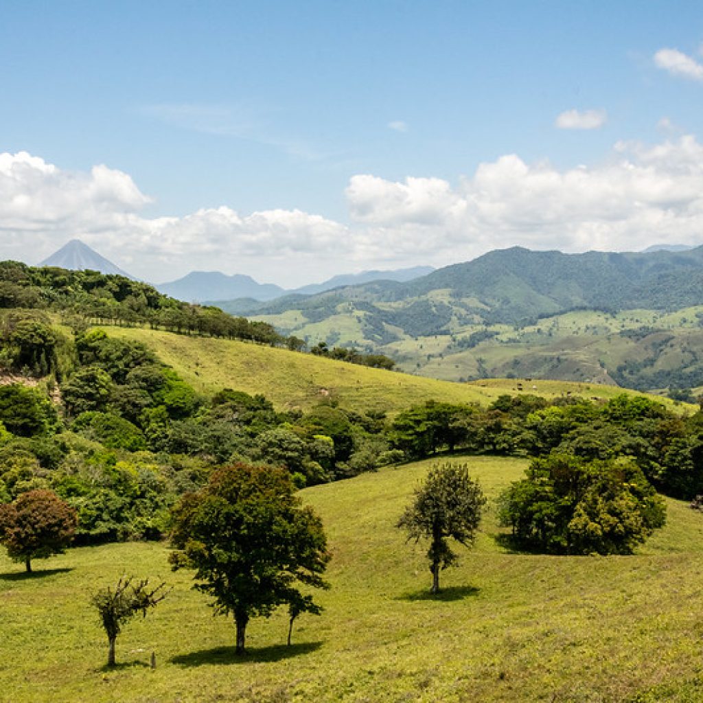 An image of Costa Rica, featuring greenery and rolling hills, showcasing the natural beauty of the region.